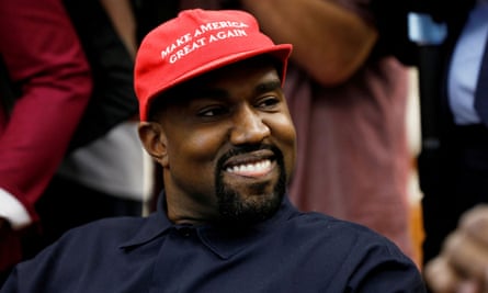 Kanye West smiles during a meeting with Donald Trump in October 2018