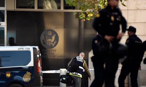 Spanish police standing guard near the US embassy in Madrid in December after a letter bomb arrived.