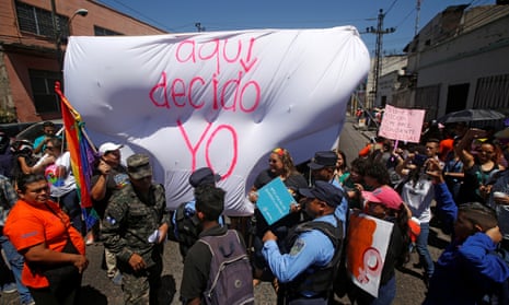 Demonstrators in Tegucigalpa, the capital of Honduras, brandish mock underwear emblazoned with the slogan: ‘I decide here'