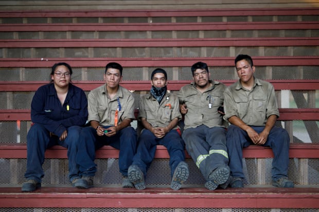 From left, Bryden Williams and partner Ryan Webster, along with brothers Wade, Wayne, and Mathew Webster are photographed after their firefighting shift at the Tk’emlups pow-wow grounds.