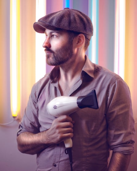 man with hairdryer
