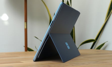 Microsoft Surface Pro 11 propped up on a desk with its kickstand extended.