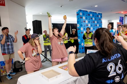 A team cheers after completing a puzzle.
