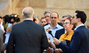 Journalists ask questions of Prime Minister Scott Morrison at a press conference