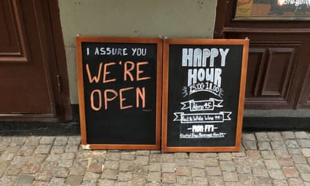 Signs outside a Stockholm bar last week.
