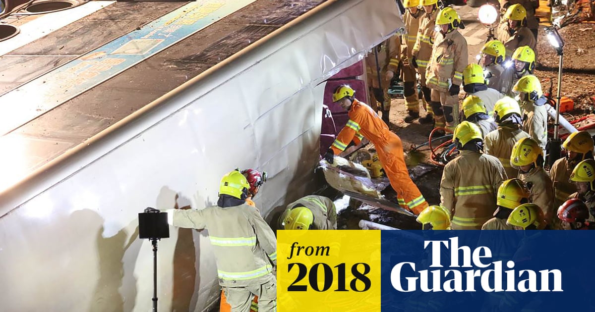 Hong Kong bus overturns, killing at least 19 people