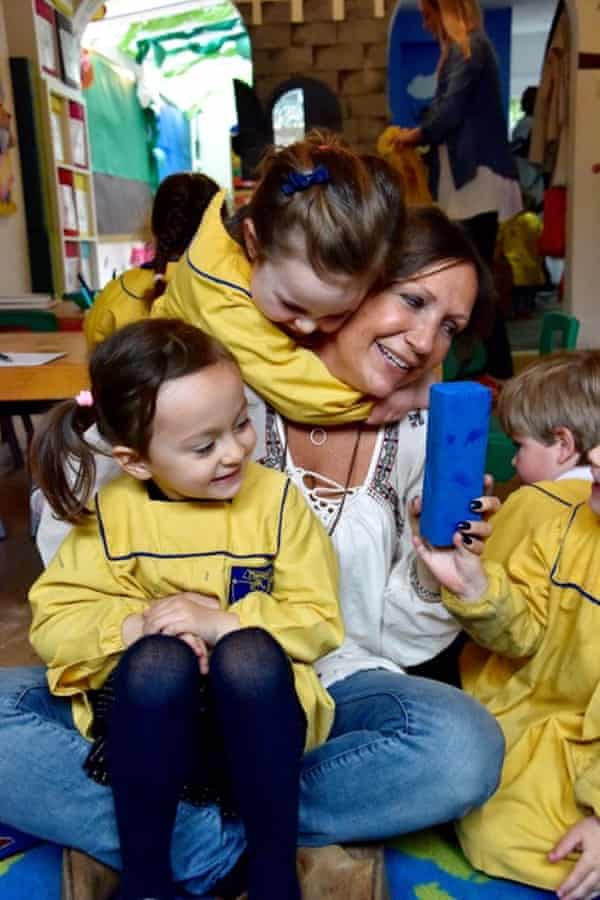 Natasha Green, with small children