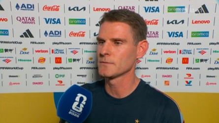 England assistant head coach Anthony Barry is interviewed at half-time of England’s 2026 opening group game against Croatia.