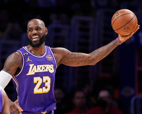 LeBron James, 41, makes more NBA history as oldest player to post triple-double | LeBron James | The Guardian