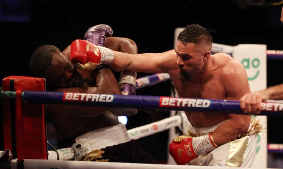 Joseph Parker pins Derek Chisora in a corner en route to winning their bout at the Manchester Arena