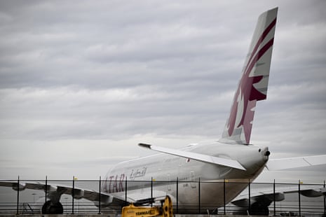 A Qatar Airways aircraft at Sydney international airport on Tuesday. Tens of thousands of Australians in the Middle East have no way to get home after major missile strikes on Iran triggered travel chaos.
