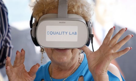 An elderly woman in Miami tests out a virtual reality device marketed to the elderly.