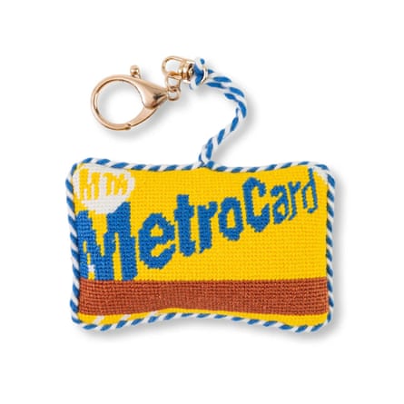 A knitted NYC Metrocard Maison Flaneur key chain charm