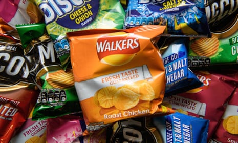 The colourful wrapping and attractive advertising of calorie-rich foods encourage people to buy items that put them at risk of overeating, says neuroscientist Wolfram Schultz.