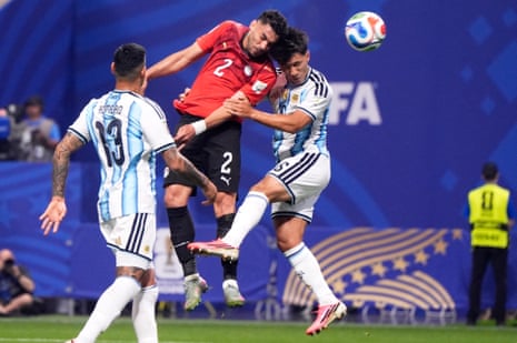 Egypt's Yasser Ibrahim (centre) scores his side's opening goal.