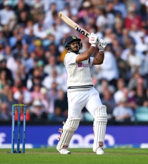 Shardul Thakur sends the ball into the stands.