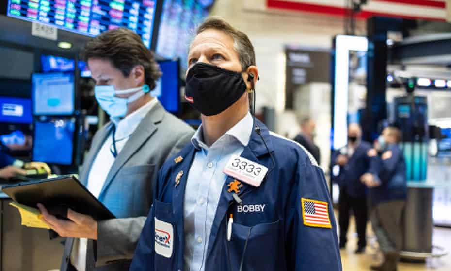 Traders on the floor of the New York Stock Exchange today