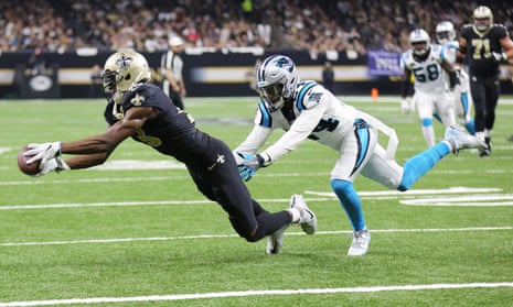 Michael Thomas catches a pass for New Orleans.