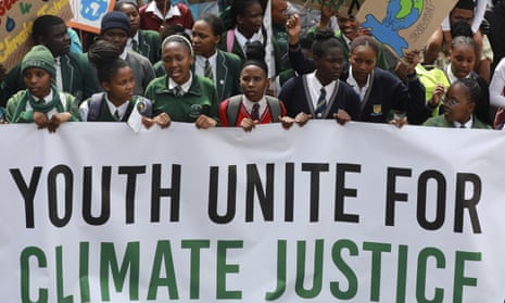 Young people take part in a protest in Cape Town, South Africa, last month calling for the government to take immediate action to halt  the climate crisis.