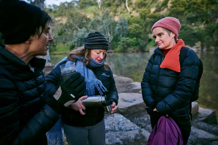 Amanda Donahoe, Meg Alkins and Fran Cusworth share a hot drink after a swim.
