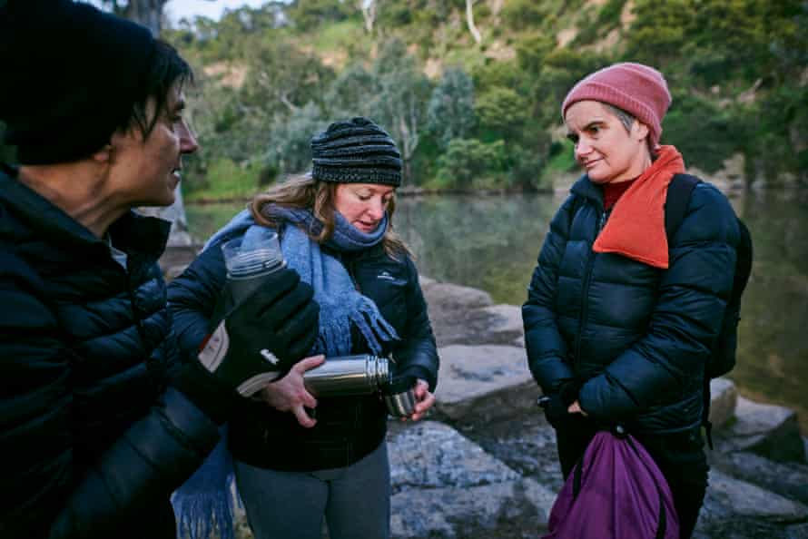 Amanda Donahoe, Meg Alkins & Fran Cusworth share a warm drink after their swim.