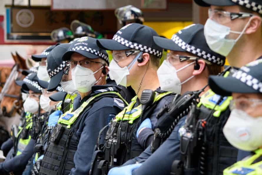 Police stand guard at the Black Lives Matter rally organised by the Warriors of Aboriginal Resistance in Melbourne, Australia
