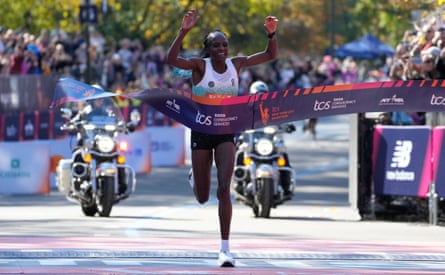 Hellen Obiri crosses the line to win the women's elite race.