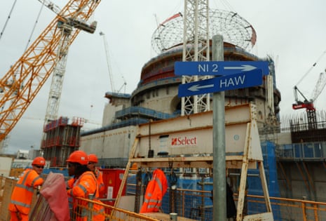 Land crane "Big Carl" lifts a 245-tonne domed roof onto the second reactor building at the Hinkley Point C nuclear power station, near Bridgwater