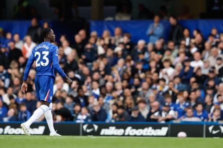 Trevoh Chalobah of Chelsea leaves the pitch after receiving a red card for a tackle on Brighton’s Diego Gómez