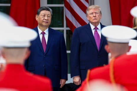 two men stand next to each other