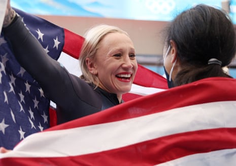 Kaillie Humphries celebrates her Olympic monobob gold medal at the 2022 Winter Olympics in Beijing.