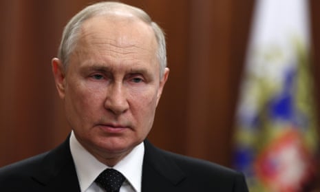 Vladimir Putin delivers a televised address to the nation in Moscow on Saturday