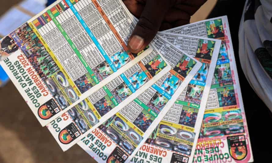 A vendor has schedules for the African Cup of Nations in Yaoundé, the capital of Cameroon