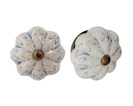 Two floral ceramic cabinet knobs