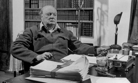 Winston Churchill at his desk.