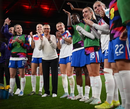 Sarina Wiegman applauds her players after the win over Portugal in May