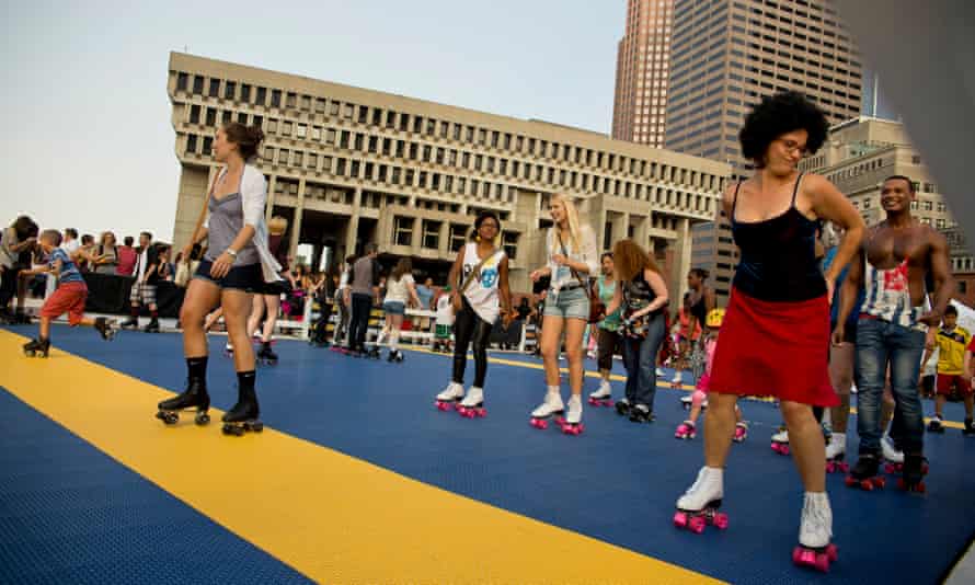 A mass Donna Summer roller disco tribute takes palce outside Boston City Hall.
