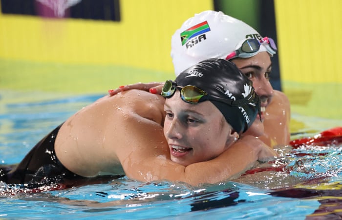 Summer Macintosh celebrates with South African Rebecca Meder after winning the gold medal.