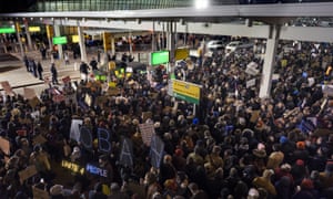 Protesters assemble at John F. Kennedy International Airport in New York.