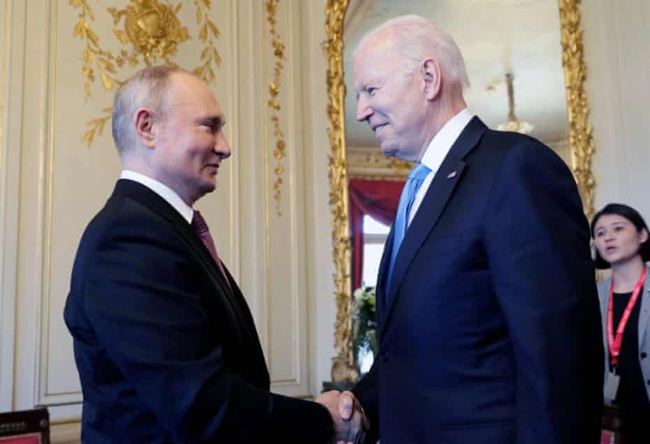 Vladimir Putin shakes hands with Joe Biden during their meeting at the Villa La Grange in Geneva, Switzerland, on 16 June 2021.
