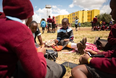 Students eating during a lunch break.