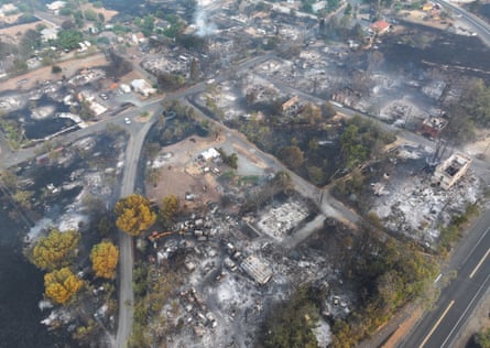 an aerial view of a burned out town