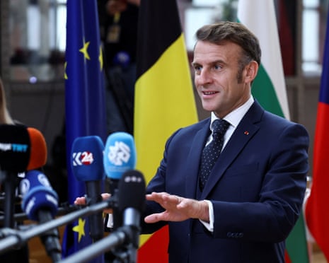 France’s president Emmanuel Macron speaks to the media as he arrives at a European Union leaders’ summit in Brussels, Belgium.