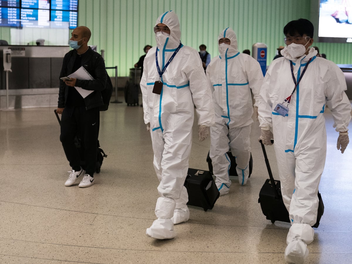 older unvaccinated people should delay travel says who as omicron restrictions spread coronavirus the guardian