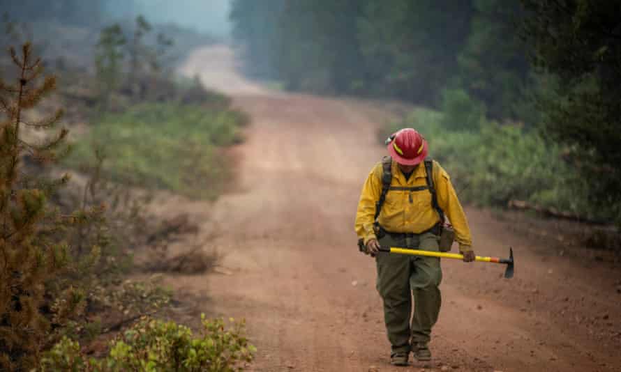 Firefighters continue to battle the Bootleg fire in Silver Lake, Oregon, on 29 July.