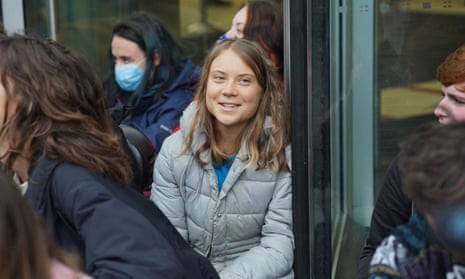 Greta Thunberg with protesters from Fossil Free London in a demonstration outside JP Morgan's Canary Wharf offices on Thursday.