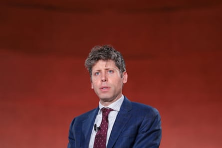 Man in front of rust-coloured background