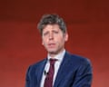 Sam Altman against a red background.