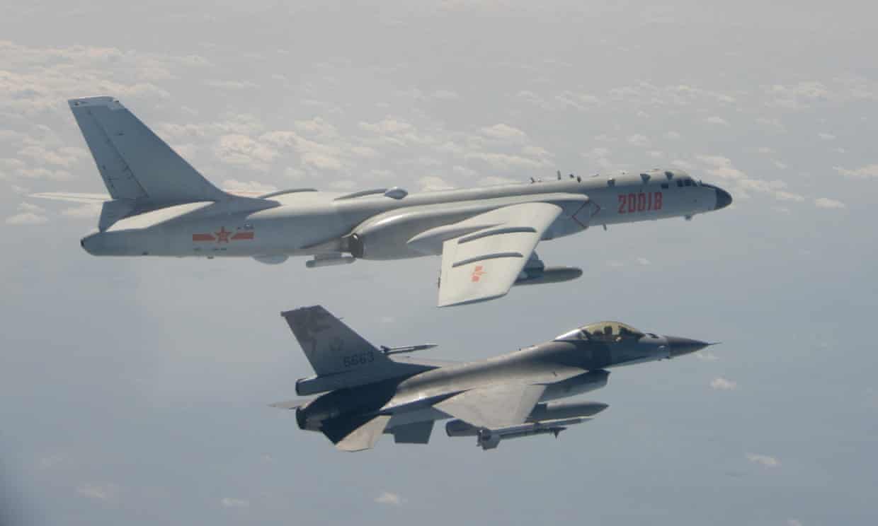 <div class=__reading__mode__extracted__imagecaption>A Taiwanese fighter jet flying next to a Chinese bomber (top) off the coast of Taiwan in February 2020. China has almost doubled its incursions this year. Photograph: Taiwan's Defence Ministry/AFP/Getty Images<br>A Taiwanese fighter jet flying next to a Chinese bomber (top) off the coast of Taiwan in February 2020. China has almost doubled its incursions this year. Photograph: Taiwan's Defence Ministry/AFP/Getty Images</div>