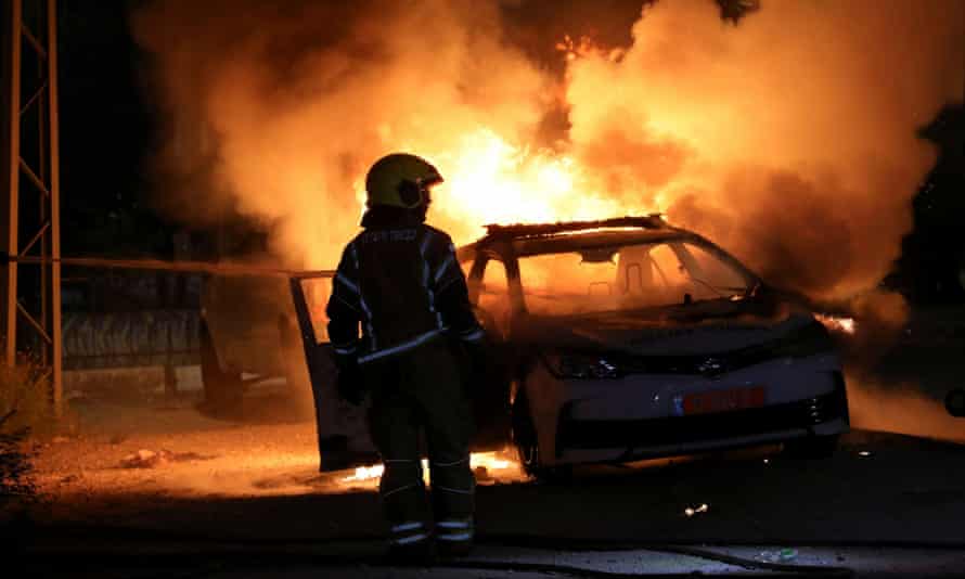 A burning car in the Israeli town of Lod